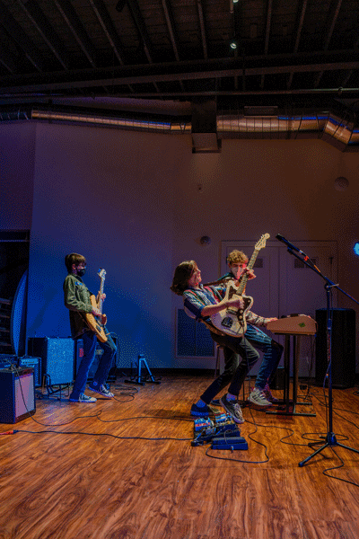 Rock band kids Kids jamming on a song