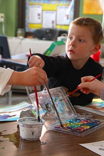 Kid With Watercolor Paint